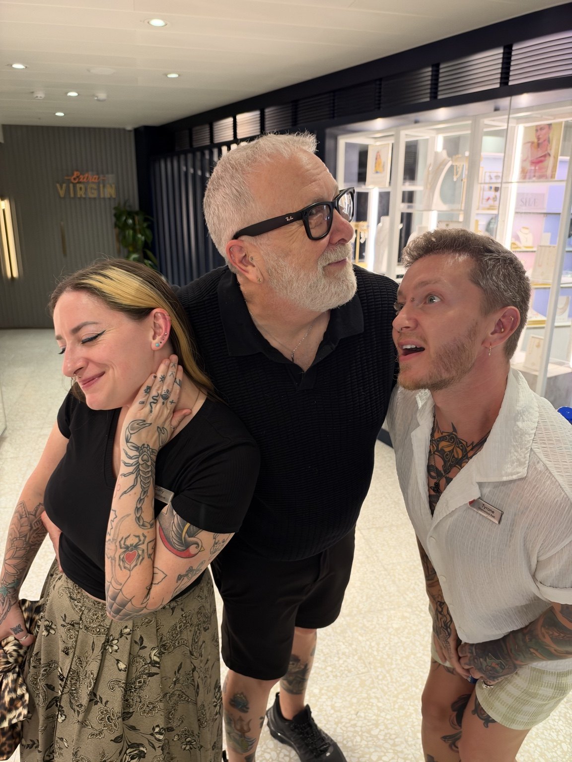Carly, Tyrone and me after we all got new ear piercings. A souvenir we took home together.